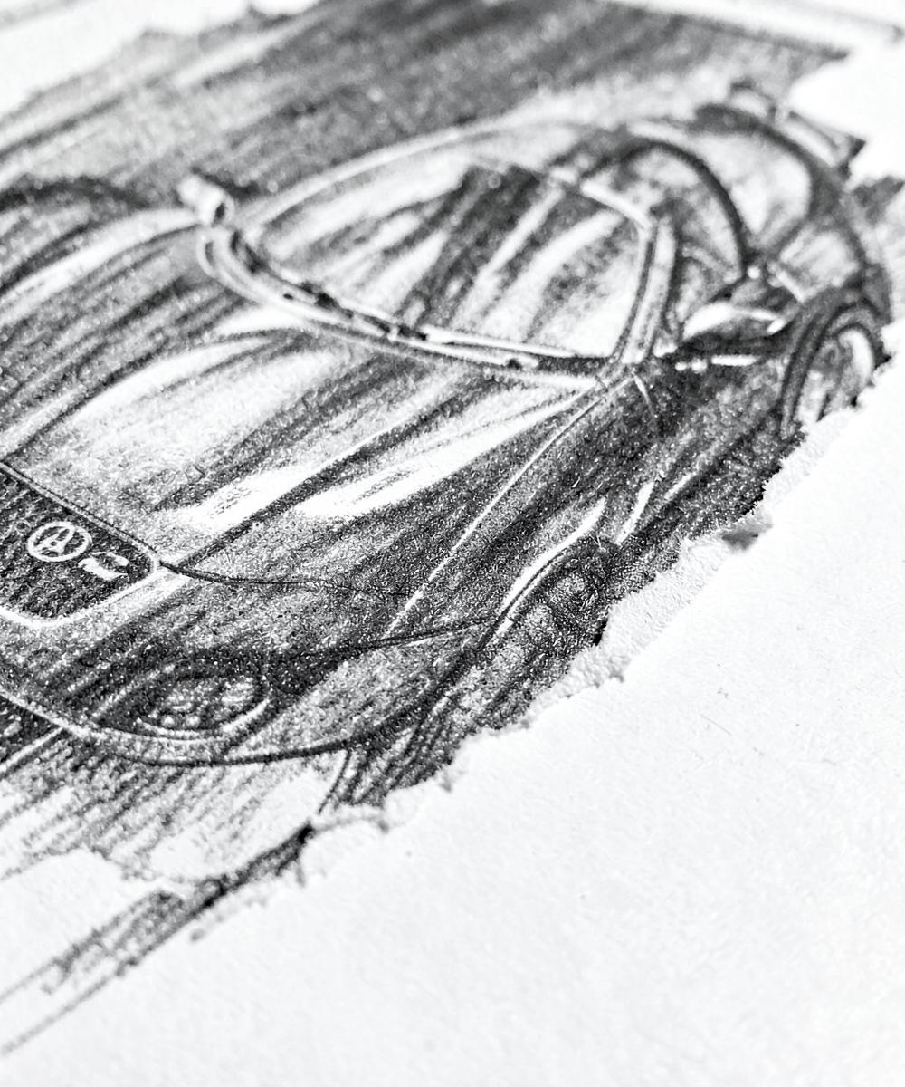 Close-up of a torn paper edge on pencil car artwork